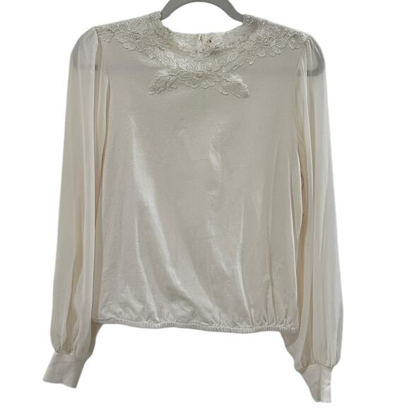 Anthropologie Tiny Long-Sleeve
Mock-Neck Lace Embellished Top - Picture 4 of 9